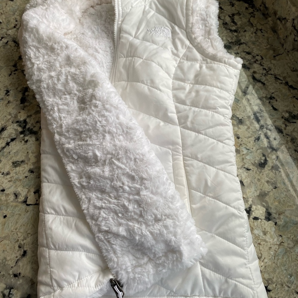 New!  soft fur inside, it’s a reversible vest